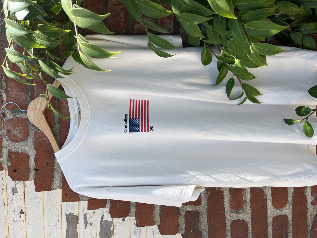 Front of the USA 250 shirt: the American flag with Campflare 250